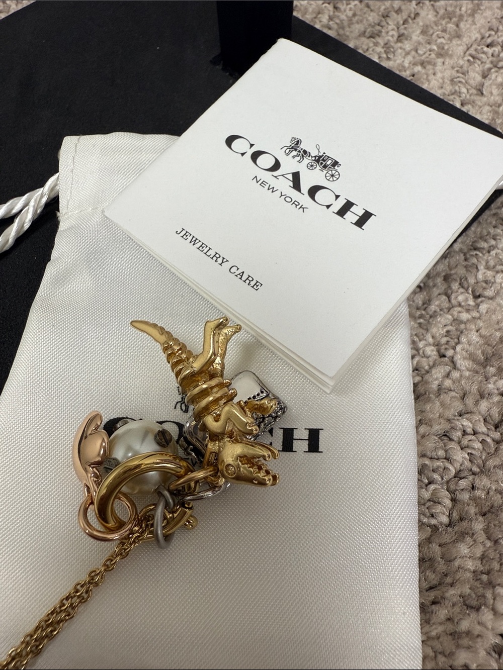 Rare COACH Rexy Gold-Tone Multi-Charm Necklace with Rexy, Pearl & Floral Charms - Picture 8 of 8